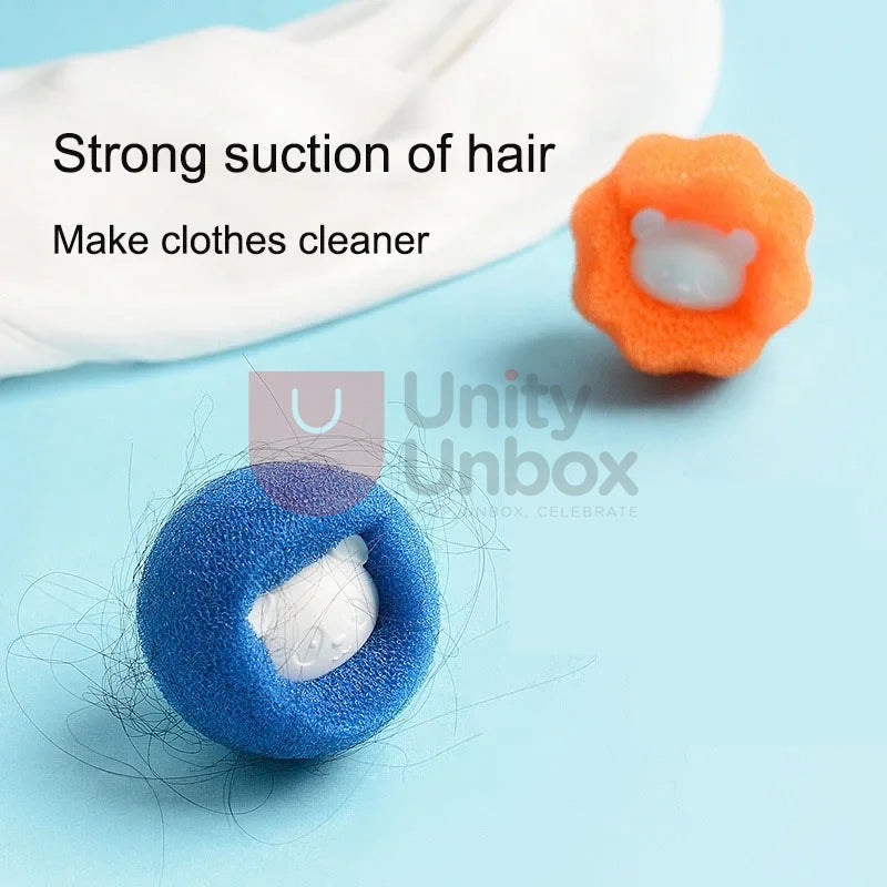  A blue, round, sponge-like ball with small protrusions on its surface. Text on the image reads &quot;Strong suction of hair&quot; and &quot;Make clothes cleaner.